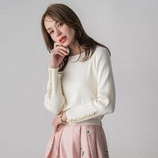 袖フリルパールリブニット