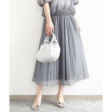 MK ミッシェルクラン(MK MICHEL KLEIN)のデニム調シアープリーツスカート/洗える