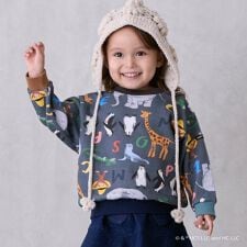 プティマイン(petit main)の【おさるのジョージ】総柄トレーナー