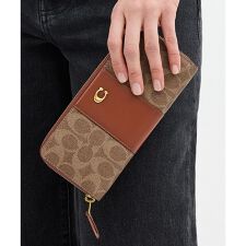 コーチ(COACH)のエッセンシャル スリム アコーディオン ジップ ウォレット・シグネチャー キャンバス