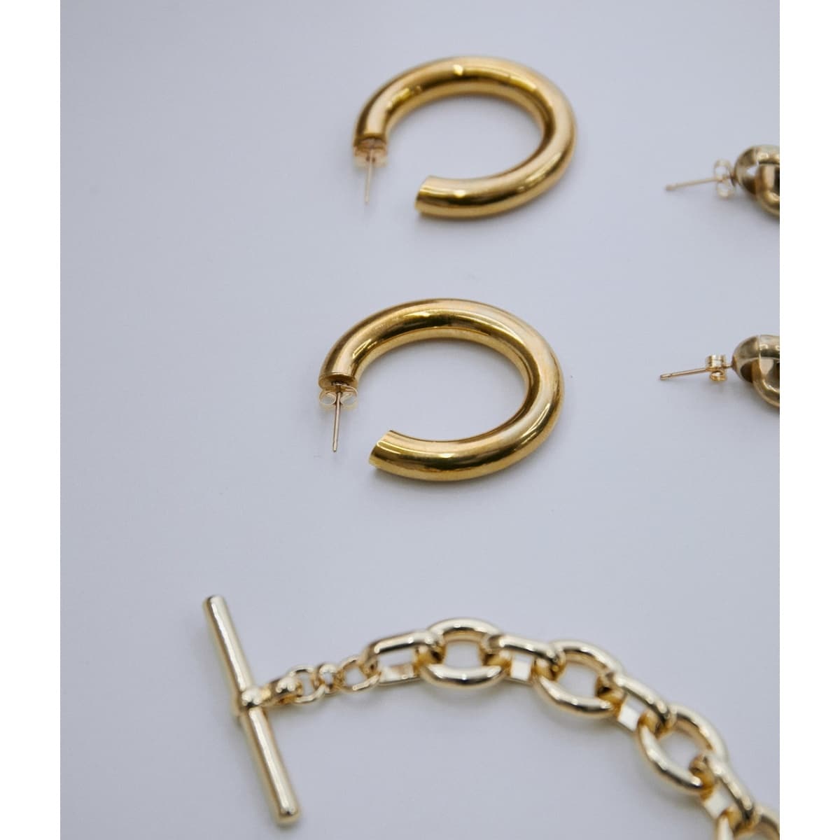 Laura Lombardi】MINI CURVE EARRINGS | アダムエロペ(ADAM ET ROPE') | マルイウェブチャネル