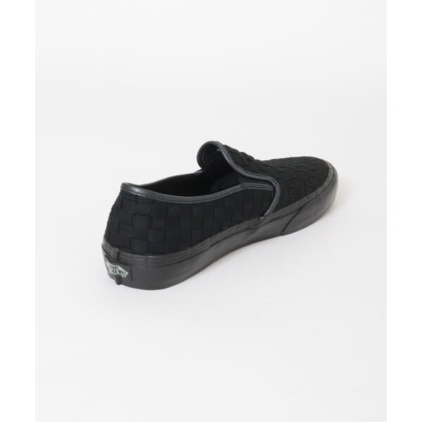 vans black mono slip on