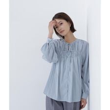 ナチュラルビューティーベーシック(NATURAL BEAUTY BASIC)のリボンギャザーブラウス