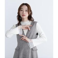 ナチュラルビューティーベーシック(NATURAL BEAUTY BASIC)のシアーフレアカフスリブニット