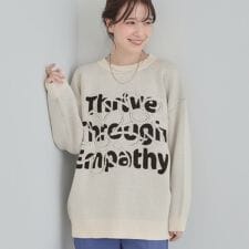 【体型カバー】ちくちくしにくい お花ロゴジャカードスウェットライクニット