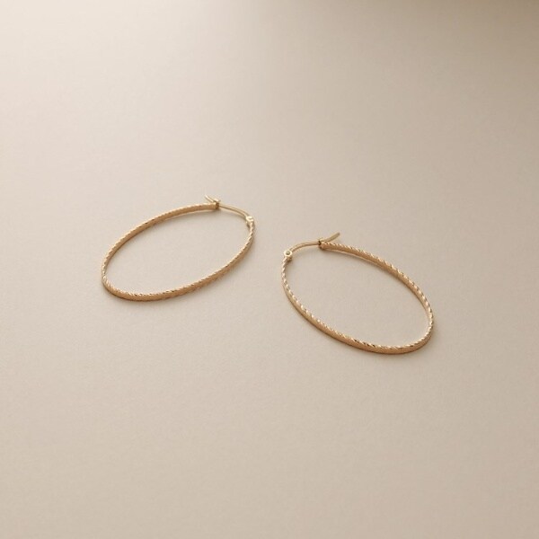 【美品】COCOSHNIK k10 サイドカットオーバルフープピアス K10サイドカットオーバル フープピアス | ココシュニック(COCOSHNIK