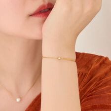 フィービィー(Phoebe)の【金属アレルギー対応】グッリターハーフバングルチェーンブレスレット/サージカルステンレス