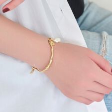 フィービィー(Phoebe)のフロウラインメタルブレスレット　ゴールド/パール