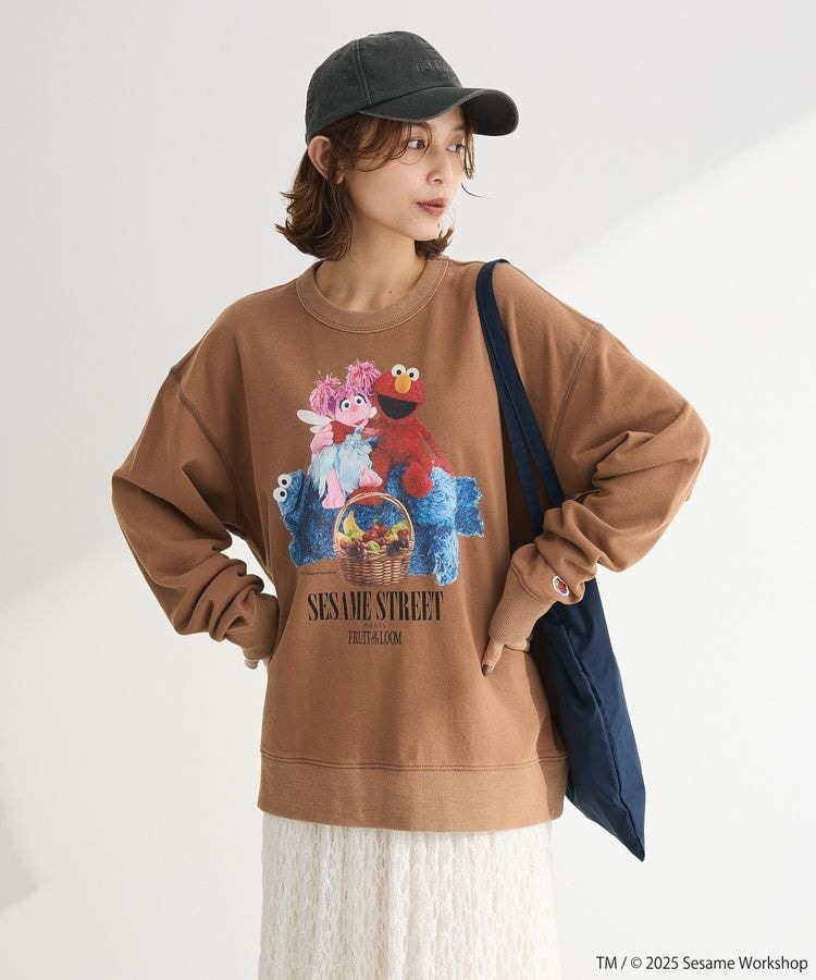 □STRANGER THINGS×MINNETONKA プリンテッドスウェット | グリーン