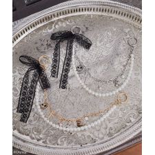 アースミュージック＆エコロジー(earth music&ecology)のナイトメア／レースリボン付きチャーム