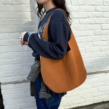 フレディエミュ(fredy emue)のポーチ付きラウンドワンショルバッグ