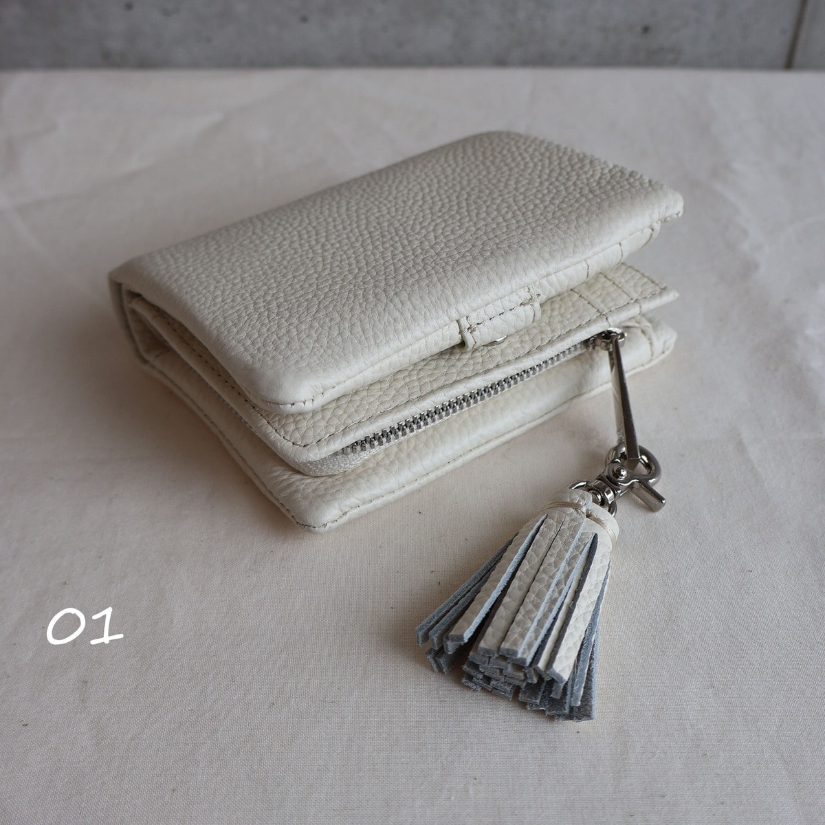 ジオメトリックアート二つ折り財布 | ホコモモラ(JOCOMOMOLA) | マルイ