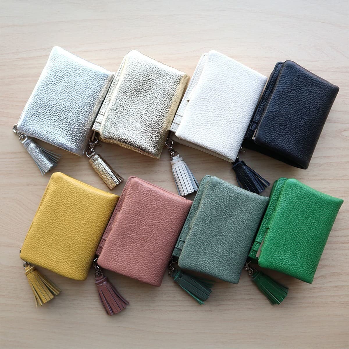 ジオメトリックアート二つ折り財布 | ホコモモラ(JOCOMOMOLA) | マルイ