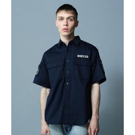 [^ԁF7833923001]BASIC FATIGUE SHORT SLEEVE SHIRT ^ x[VbN t@eB[O  VcOZ[łsFATIGUEtV[Y̔VcBƂRbgcCngpAVIREX炵ځBfUCAVIREX̃OZ[ut@eB[OTVcṽfUCJ[LVcɗƂ܂ꂽ1BڂAVIREXƂ킩鑶݊̃VcɂȂĂBVvȃfUC̒ɂA~^[fBeB[ƃOtBbN[NƂ܂ꂽBꖳ̃ACeByAVIREX^ABbNXz1975NɃAJR̃RgN^[ƂđnƂAtCgWPbgł̔FmxIɍ߂B~^[ɋNABbNX́A@\IȃfUCoL̔ɎxĂB̌Iȕ\́AfuCfB[EW[YvugbvKvutBXxvȂǂ̃XN[ł􂵁Aт𗁂тB̖ʂ̖fUCAmX^WbNȖ킢͍ȂȆ̐lXxꑱĂB