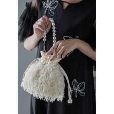 ニアナ(niana)のシャギー巾着バッグ