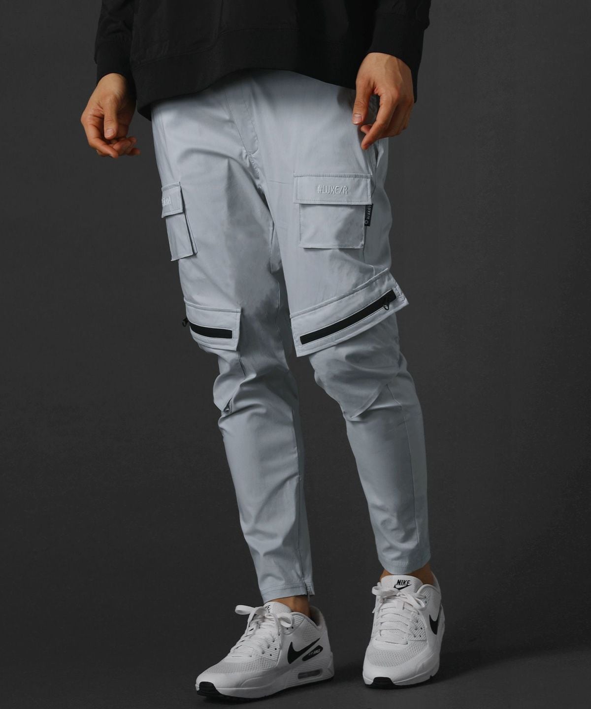 R/防水ストレッチ布帛メッシュ使い裾ジップパンツ | レジェス(REZES