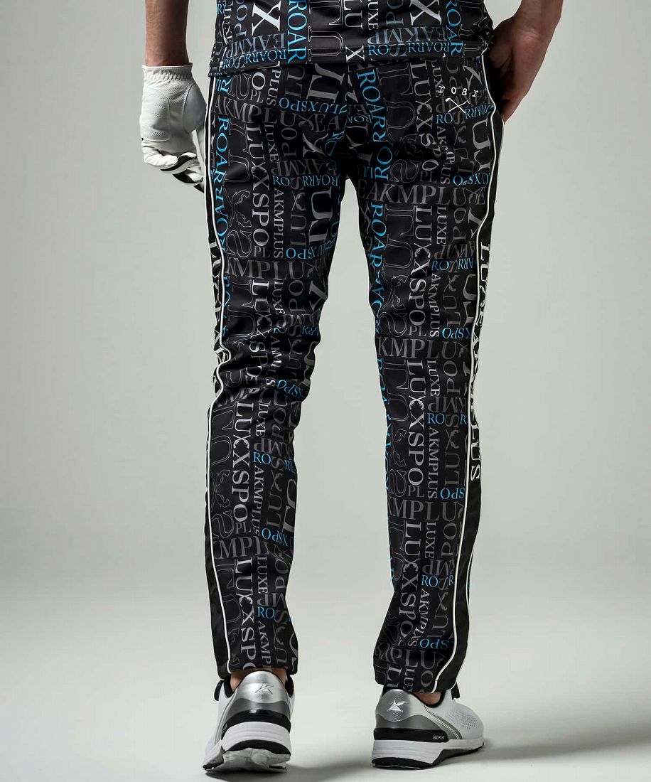 LUXEAKMPLUS×roar ゴルフ 総柄ロゴ防風ロングパンツ | リュクス