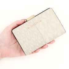 マイケル・コース(Michael Kors)のJET SET TRAVEL ビルフォールド ジップ コンパクトウォレット ミディアム