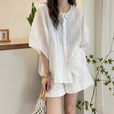 ドゥーベル(Doux Belle)の前開きノーカラーシャツ