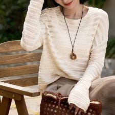 ドゥーベル(Doux Belle)の透け感ボーダーニットトップス