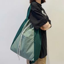 ドゥーベル(Doux Belle)のドローストリングトートリュック