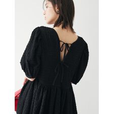 コエル(COEL)のポップコーンペプラムブラウス