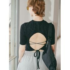 コエル(COEL)のバックオープングリッターTシャツ