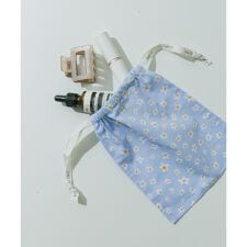 スメリー(SMELLY)の『WEB/一部店舗限定』プリントキンチャクポーチ