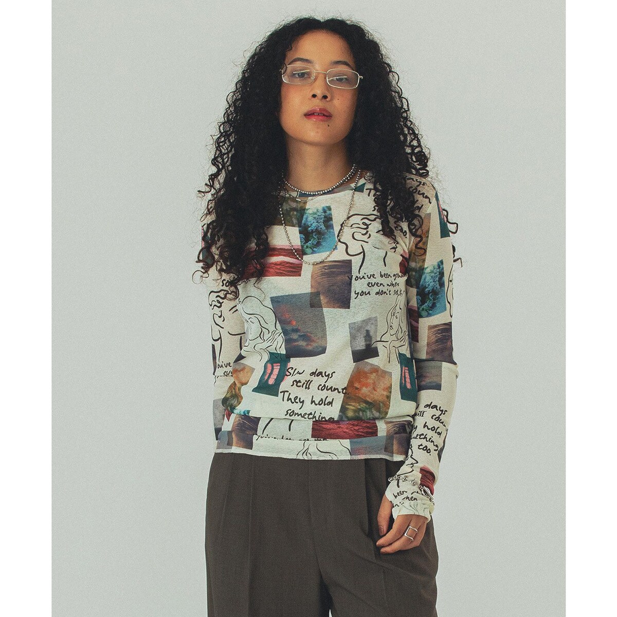 SLY COLLAGE PRINT トップス　完売品 SLY（スライ）の「COLLAGE PRINT TOPS コラージュ プリント