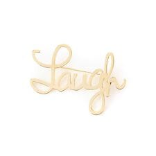 ネミカ(NEMIKA)のLaughモチーフブローチ【NEMIKA】